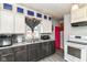 This kitchen features sleek, two-tone cabinetry and modern appliances at 3302 N Gladstone Ave, Indianapolis, IN 46218