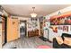 Cozy living room with wood-look flooring, neutral walls, and artistic decor at 3302 N Gladstone Ave, Indianapolis, IN 46218