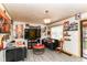 Large living area perfect for gathering, featuring neutral walls and wood-look flooring at 3302 N Gladstone Ave, Indianapolis, IN 46218