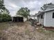 View of the backyard and shed, showing potential for outdoor living and storage at 350 Johnson Ave, Franklin, IN 46131