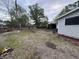 Backyard featuring grassy areas, utility access, and a shed; great for outdoor activities at 350 Johnson Ave, Franklin, IN 46131