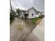 Charming single-Gathering home featuring a gravel driveway and welcoming front porch at 350 Johnson Ave, Franklin, IN 46131