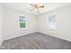 Cozy bedroom with carpet flooring, neutral walls, ceiling fan and ample natural light at 3631 Columbus Ave, Anderson, IN 46013