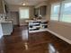 Bright kitchen features gray cabinets, butcher block countertops, and modern backsplash at 3720 W 16Th St, Indianapolis, IN 46222