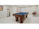 Finished basement includes a pool table area with space for entertaining friends and Gathering at 3743 Earhart Dr, Carmel, IN 46074