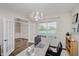 Bright home office with a large window and french doors at 3743 Earhart Dr, Carmel, IN 46074