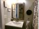 Charming bathroom with a stylish mirror, vanity, and decorative accents at , Plainfield, IN 46168