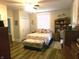 Comfortable bedroom with charming decor, hardwood floors, and ample natural light at , Plainfield, IN 46168