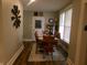 Traditional dining room with wooden table, chairs, and hardwood floors at , Plainfield, IN 46168