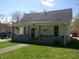 Charming single-story home with a covered front porch and well-maintained lawn at , Plainfield, IN 46168