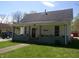 Charming single-story home with a covered front porch and well-maintained lawn at , Plainfield, IN 46168