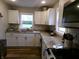 Bright kitchen featuring white cabinetry, granite countertops, and modern fixtures at , Plainfield, IN 46168