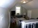 Finished attic living space with a comfortable couch, TV, and playful items at , Plainfield, IN 46168