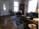 Cozy living room with a large rug, sofa, and natural light at , Plainfield, IN 46168