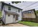 Backyard featuring wooden deck, white siding, and green grass at 4244 Rookwood Ave, Indianapolis, IN 46208