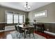 Dining room with a table, seating, and ample natural light at 4244 Rookwood Ave, Indianapolis, IN 46208