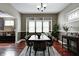 Dining room with table, seating, and ample natural light for gatherings and meals at 4244 Rookwood Ave, Indianapolis, IN 46208