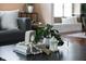 Stylishly decorated coffee table with plants and decorative objects in living room at 4244 Rookwood Ave, Indianapolis, IN 46208