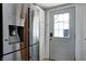 Modern refrigerator with water dispenser with door to outside at 4244 Rookwood Ave, Indianapolis, IN 46208