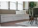 Comfortable window seat features built-in storage and natural light at 4244 Rookwood Ave, Indianapolis, IN 46208