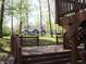 A large wooden deck offers views of the backyard and the inviting home at 4363 E State Road 252, Franklin, IN 46131