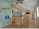 Tropical-themed bar area with thatched roof, stools, and a relaxed atmosphere, bringing a vacation vibe to your home at 4363 E State Road 252, Franklin, IN 46131