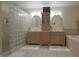 Bright bathroom features double vanities, a glass-block shower, and a soaking tub at 4363 E State Road 252, Franklin, IN 46131