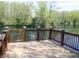 Wooden deck features beautiful views of the tranquil pond at 4363 E State Road 252, Franklin, IN 46131