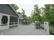Spacious deck featuring outdoor seating, a grill, and picturesque views of the surrounding greenery at 4363 E State Road 252, Franklin, IN 46131