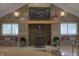 Rustic stone fireplace framed by white-shuttered windows at 4363 E State Road 252, Franklin, IN 46131