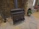 Charming Englander wood stove with stone surround at 4363 E State Road 252, Franklin, IN 46131