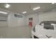 Spacious garage with car, Coca-Cola themed vending machine, and Colts themed decor at 4363 E State Road 252, Franklin, IN 46131