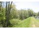 Picturesque green space near the lake with a clear blue sky at 4363 E State Road 252, Franklin, IN 46131