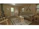 Cozy cabin living room with wood paneled walls and rustic décor at 4363 E State Road 252, Franklin, IN 46131
