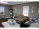 Comfortable living room with neutral paint, white rug, and decor at 4363 E State Road 252, Franklin, IN 46131