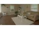 Cozy living room featuring hardwood floors, comfortable sofa, and beach-themed decor at 4363 E State Road 252, Franklin, IN 46131
