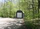 View of the outbuilding in the property featuring double doors and grey horizontal siding at 4363 E State Road 252, Franklin, IN 46131