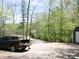 Gravel drive and parking area next to a shed; pickup truck in the background at 4363 E State Road 252, Franklin, IN 46131