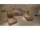 Finished theater room featuring multiple lounge chairs, projector, and tiered seating at 4363 E State Road 252, Franklin, IN 46131