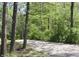 View of a gravel walking path surrounded by trees, offering a peaceful and natural setting at 4363 E State Road 252, Franklin, IN 46131