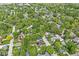 Aerial neighborhood view features tree-lined streets and various home styles at 440 W Marion St, Danville, IN 46122