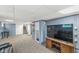 Finished basement offering flexible space with a TV, storage, and a cozy seating area at 440 W Marion St, Danville, IN 46122