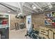 Unfinished basement area with exposed brick, weight equipment, and storage solutions at 440 W Marion St, Danville, IN 46122