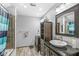 Modern bathroom featuring granite countertops, a shower, and contemporary fixtures at 440 W Marion St, Danville, IN 46122