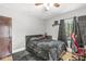 Clean bedroom with natural light, neutral walls, dark accents, and a comfortable bed at 440 W Marion St, Danville, IN 46122