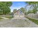Spacious two-car garage with stylish decor and a basketball hoop at 440 W Marion St, Danville, IN 46122