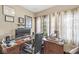 Inviting office space with a large desk, comfortable executive chair, natural light, and neutral color palette at 440 W Marion St, Danville, IN 46122