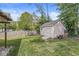 Backyard shed with a ramp, providing ample storage space in a well-maintained outdoor setting at 440 W Marion St, Danville, IN 46122
