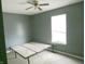 Bedroom featuring neutral walls, natural light and a minimalist bed frame at 470 N Pine St, Morgantown, IN 46160