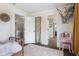 Bright bedroom with a vintage bed and a colorful stuffed animal hammock at 4749 Maple Grove Rd, Martinsville, IN 46151